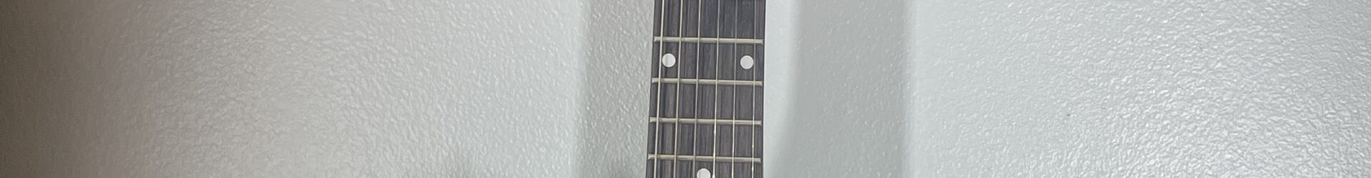 Sawtooth Tele, hot rodded and plays great. Pro fret level