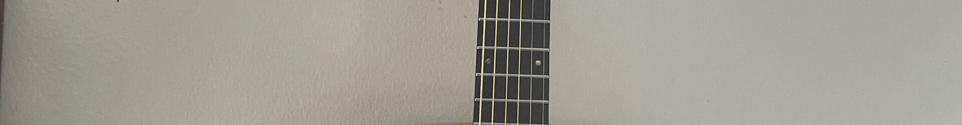 Amati Acoustic guitar w/pickup, slightly used.