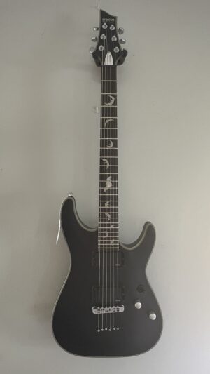 Schecter Damien Platinum, almost new, pro setup. w/coffin case.